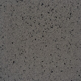 Dunkelgraues Farbmuster Baumit Mosaikputz M 342 Everest mit Glimmereffekt.