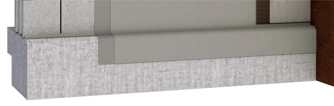 Coupe transversale d&rsquo;un mur avec des mat&eacute;riaux isolants et une couche d&rsquo;enduit, id&eacute;ale pour les r&eacute;novations &agrave; haute efficacit&eacute; &eacute;nerg&eacute;tique et les projets d&rsquo;autoconstruction.