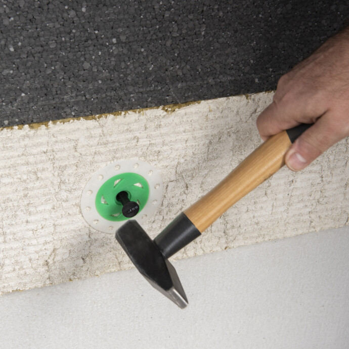 Enfoncer le clou de la cheville à frapper à disque