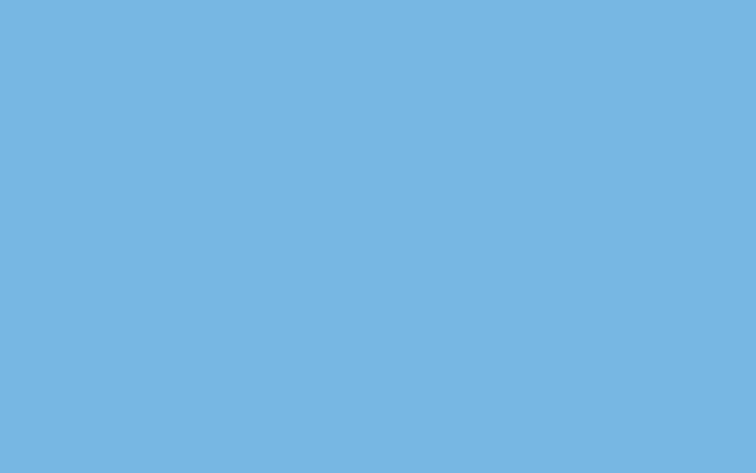 Une pièce vide avec une surface bleue en arrière-plan pour présenter les produits Baumit, dans le cadre de conseils en bricolage et d’explications sur les produits.