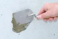 Hand verputzt Wandoberfläche mit Spachtel.