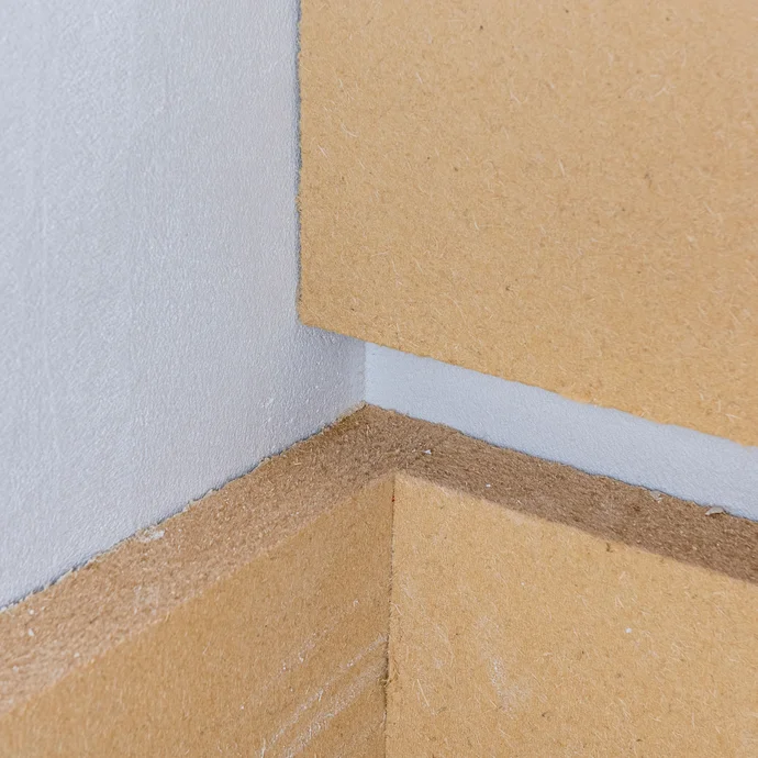 Innendämmung Detail - So werden Holzfaserdämmplatten verzahnt verklebt. Baumit Selbermachen Anleitung.